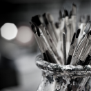 black and white photo of paint brushes